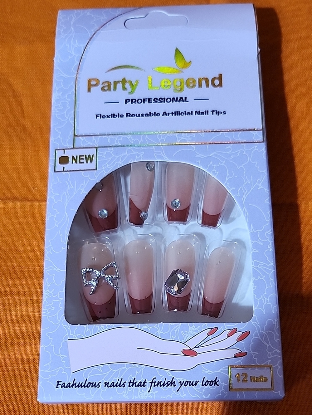 Party legend professional nails. Red tips and gems